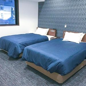 Habitación con 2 Camas Individuales